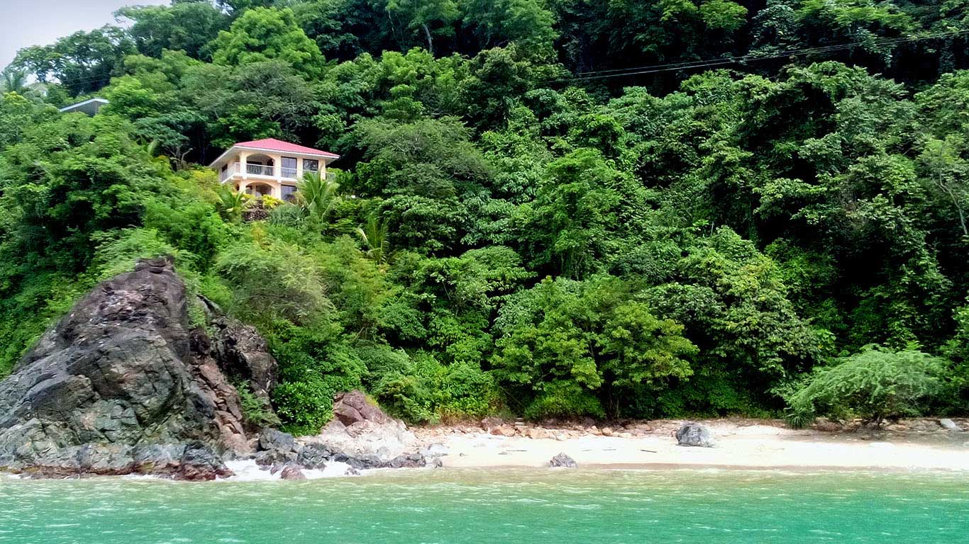 View of beach villa from boat
